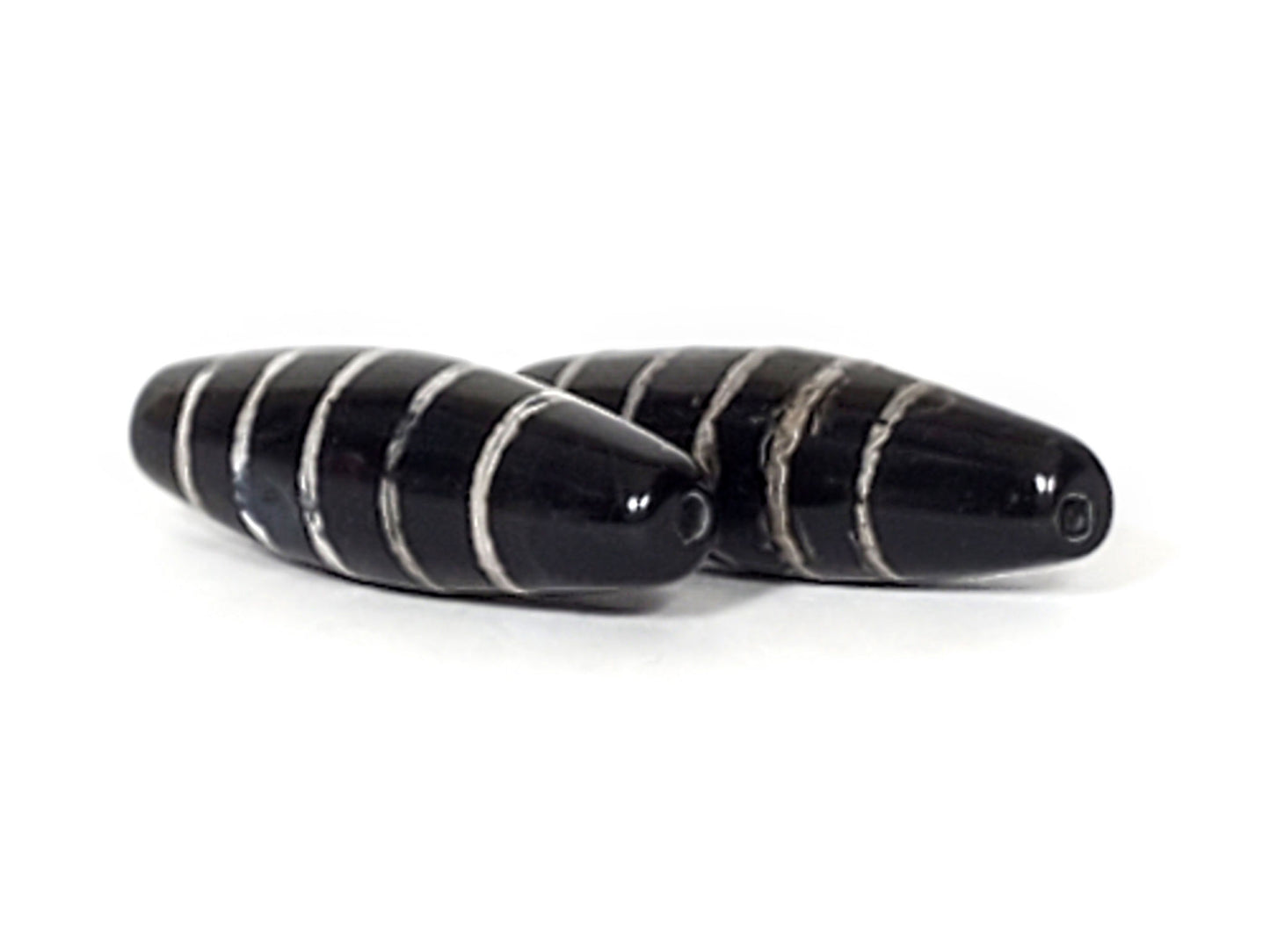 At-062626-9SChung pair nine stripe Chung dzi, both beads, shape difference visible, unretouched