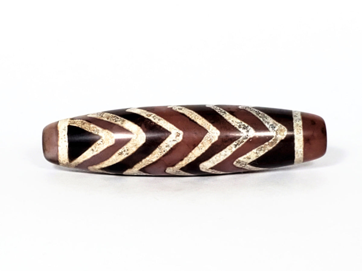 At-070822-6TS face A hero, 50.7×12.9mm chocolate-brown carnelian, 6 tiger stripe chevrons, dark end cap left, unretouched