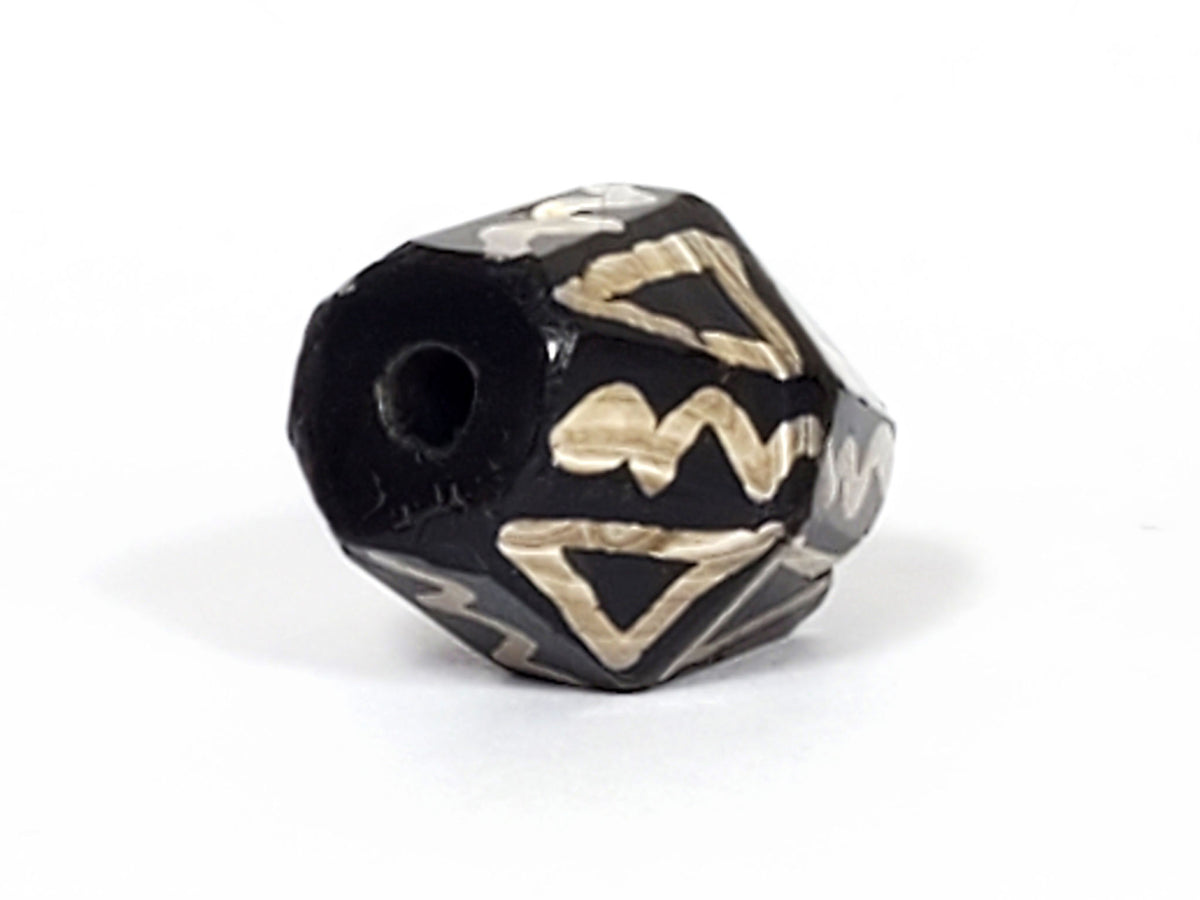 Ac-072222-OCD ancient octagonal tiger tooth wave dzi angled view showing warm honey-brown agate banding zone unretouched