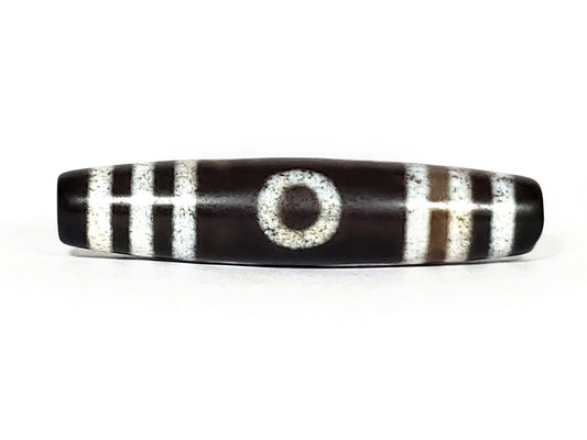 N-062426-3E2 new three eye dzi 57.9x13.3mm Face A single eye near-black ground warm rust-brown agate banding unretouched