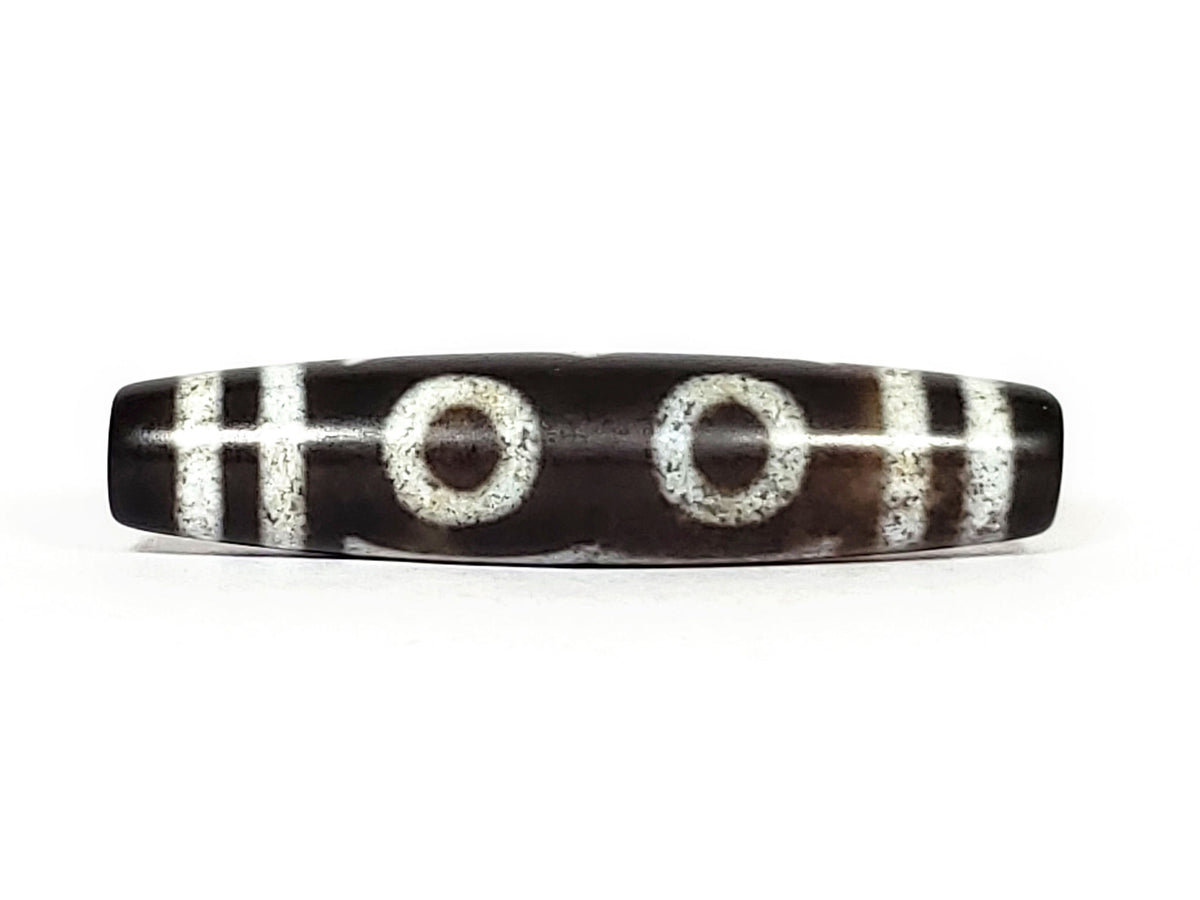 N-062426-3E new three eye dzi 58.6x13.4mm Face C two closed ring eyes side by side dark warm brown ground unretouched