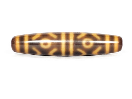 At-053126-6ETT, Face B full profile, diamond-framed eyes with tiger tooth marks, honey-gold on dark brown, unretouched