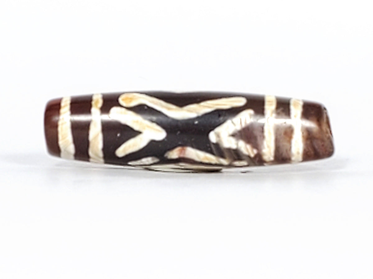 Antique carnelian dzi bead, two diamond eye tiger tooth motif, brown agate, white etched pattern, silver mount, aged patina