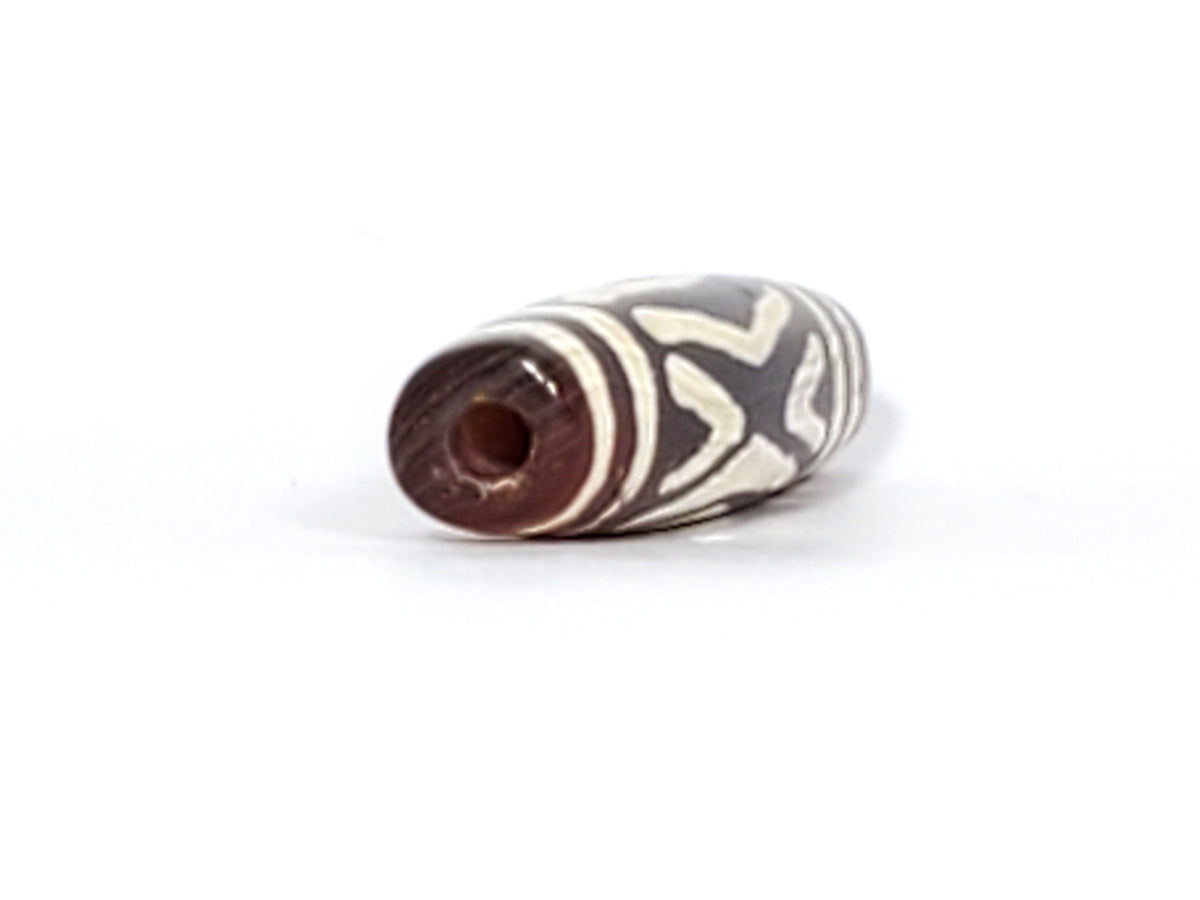 Antique carnelian dzi bead, two diamond eye tiger tooth motif, white etched patterns, brown agate, visible drill hole, aged patina