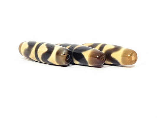 N-062626-3DWSET set three new double wave dzi, end cap view, honey-brown ends, drill holes visible, unretouched