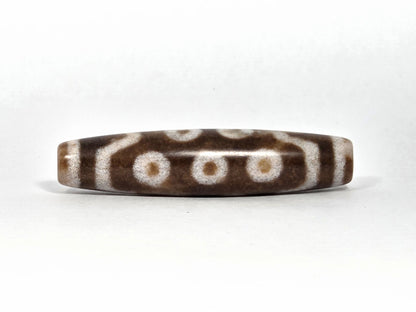 N-083126-10E new ten eye dzi bead warm brown agate underside rotation full eye row unretouched