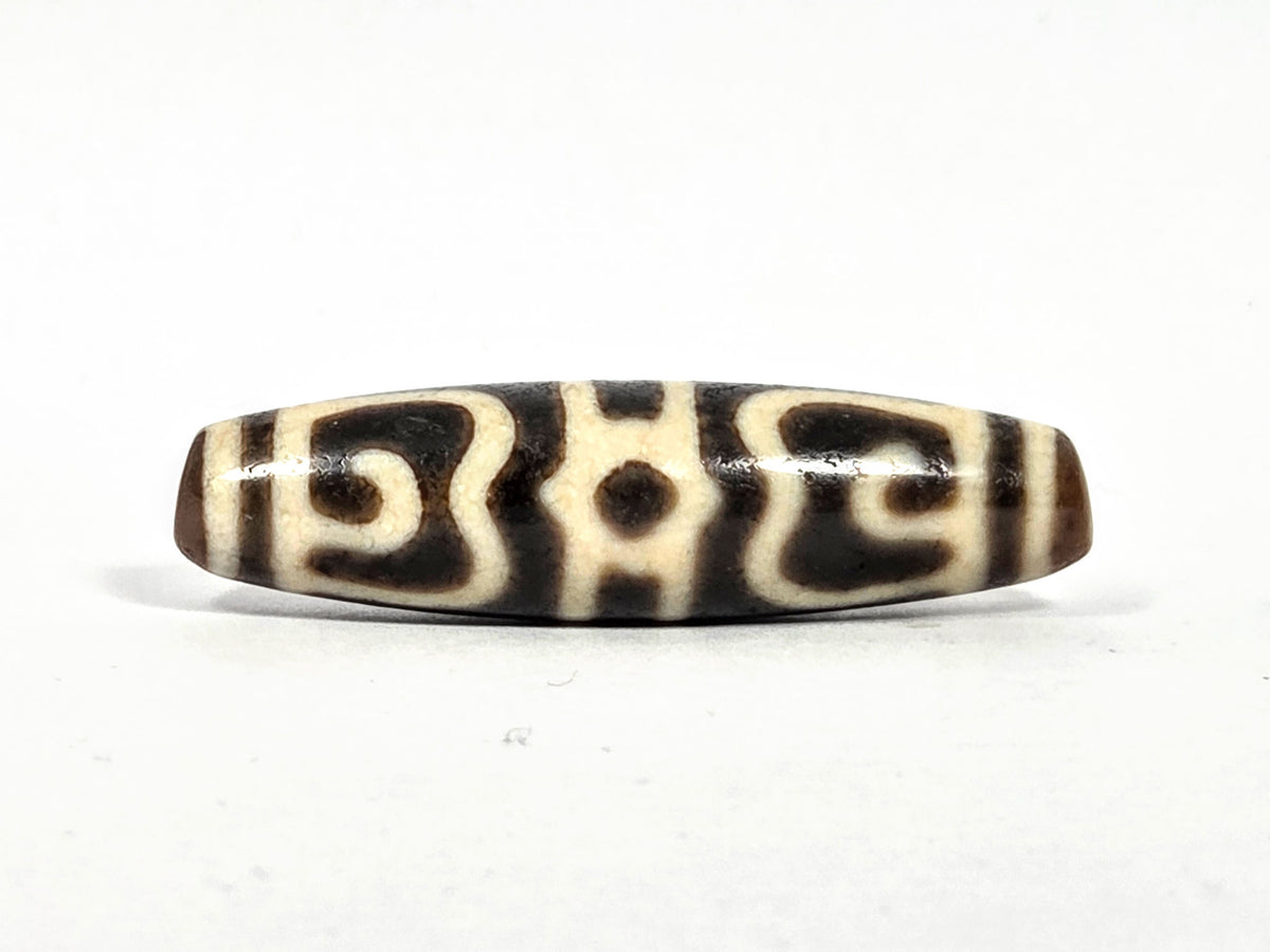 Ac-090626-GRDC3 ancient Guru Rinpoche Dharma Cap dzi face A rotated scroll bracket hexagonal star cream unretouched