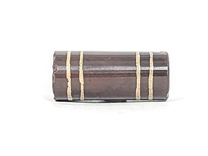 Ac-061426-4Str, right end showing extensive chip and reddish-brown interior exposed, drill hole intact, unretouched