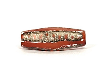 Ac-010825-4RT face B, octagonal body form visible, terracotta-red carnelian, rail track motif, dark end trim, unretouched