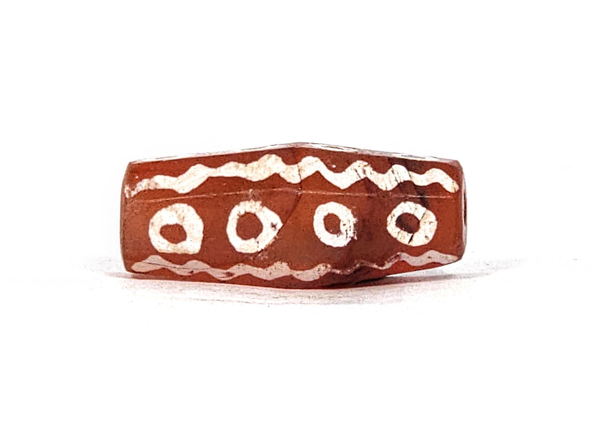 Ac-010825-16EW face D, wave band wear visible, 4 ring eyes, octagonal flat face, matte terracotta carnelian, unretouched
