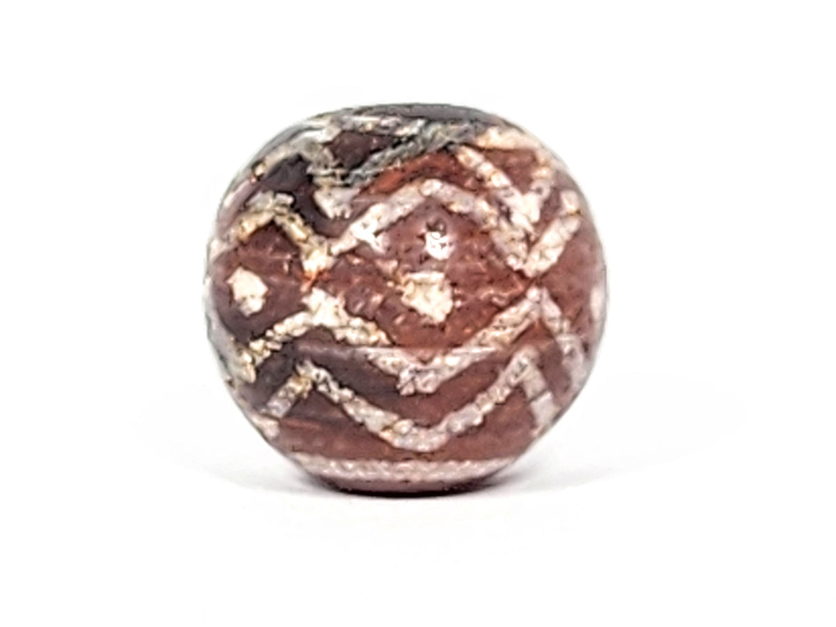 Ac-122224-TSS face D, heaviest calcification zone, tiger stripe partially obscured, reddish-brown carnelian, unretouched