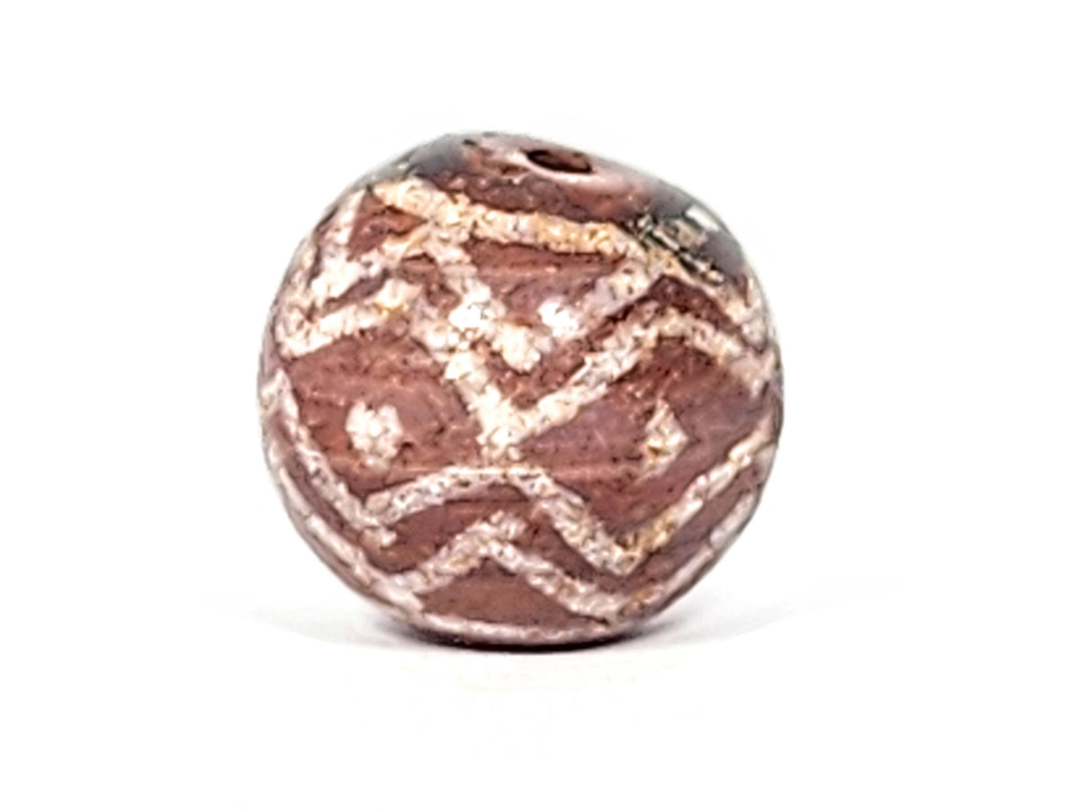 Ac-122224-TSS drill hole pole, star motif concentric ring, crossing lines, tiger stripe at outer edges, unretouched