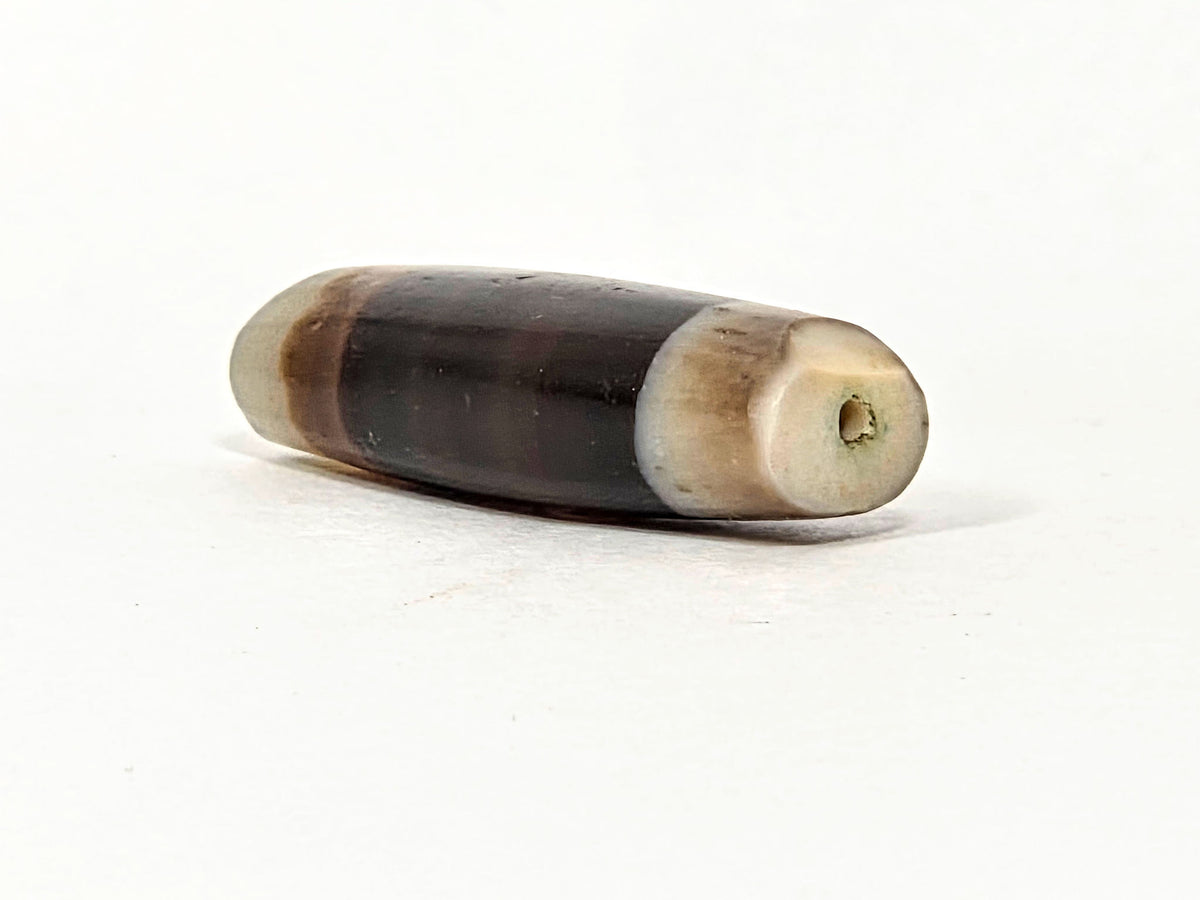 Ac-061526-1SBW, left end cap angled, medine dig or medicine chip at drill hole, unretouched