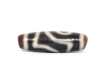 Ac-073026-2E ancient two eye dzi pitch-black agate face B second eye both drill holes visible unretouched