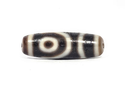 Ac-073026-2E ancient two eye dzi pitch-black agate connector face angled view wave line pattern unretouched