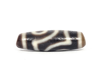Ac-073026-2E ancient two eye dzi 35.8×11.8mm pitch-black agate angled view one eye stripe bands unretouched