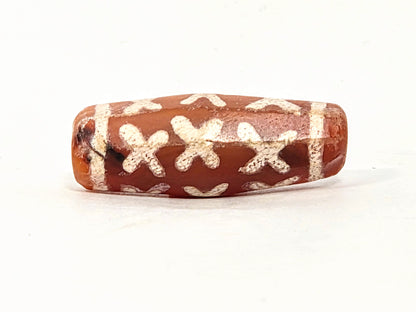 Ac-062426-12X ancient twelve X-cross carnelian dzi 28.5x11.0mm octagonal terracotta-red upper face unretouched