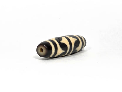 At-090226-DW8 antique double wave dzi cream black agate angled opposite drill end wave detail, unretouched
