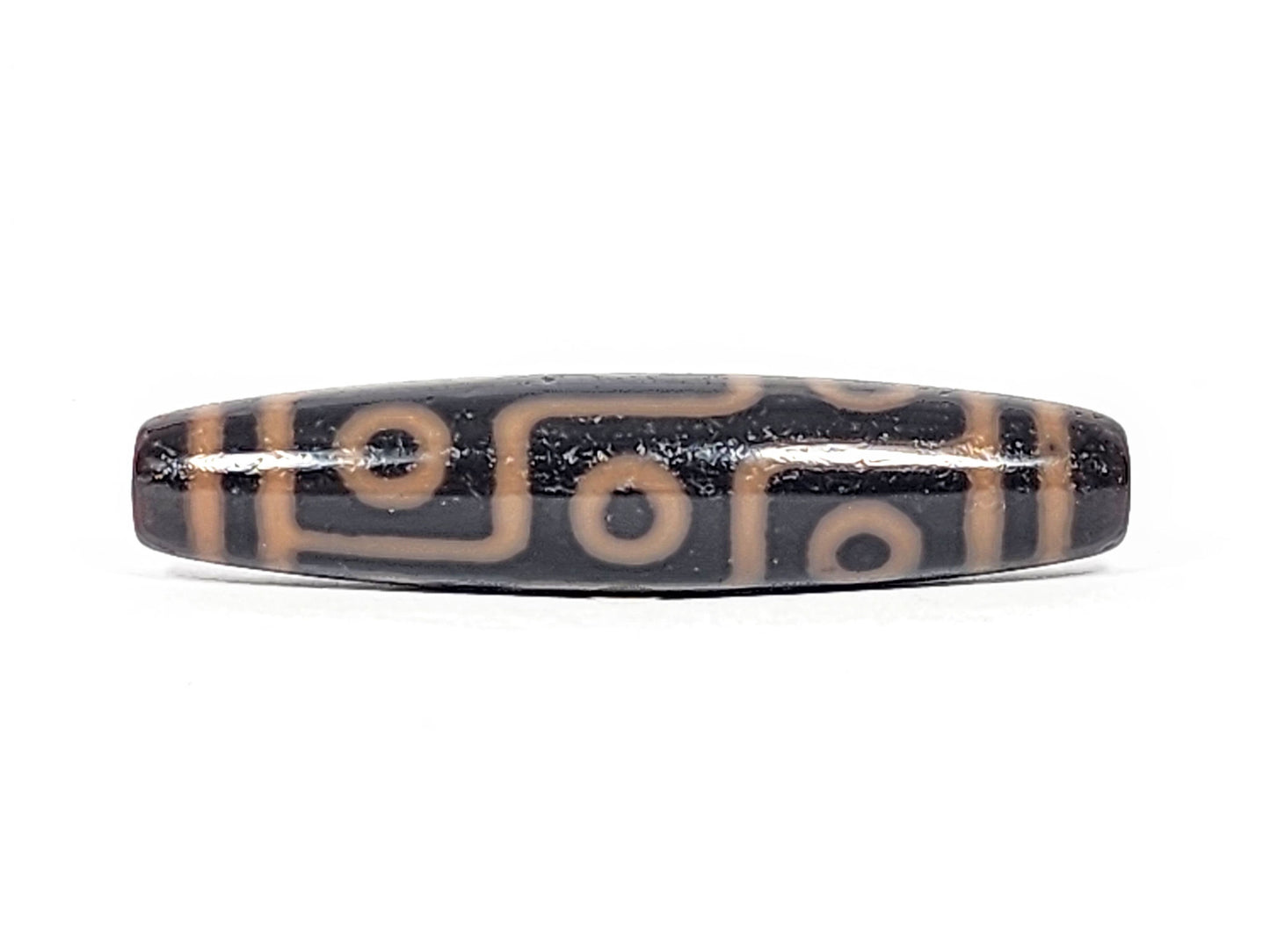 Third angle of antique nine eye dzi At-012325-9E4, warm amber-orange nine eye motif on deep dark brown natural agate, longest nine eye in collection, unretouched