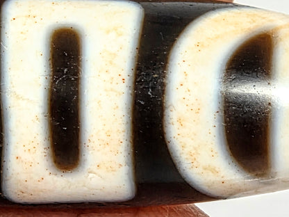 Antique Tibetan Dzi adorned with the Four Activities Motif - Beautiful Bloodspots