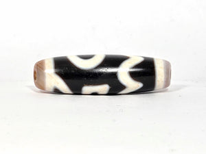 Antique Tibetan Dzi adorned with the Four Activities Motif - Beautiful Bloodspots