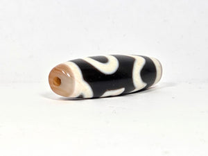 Antique Tibetan Dzi adorned with the Four Activities Motif - Beautiful Bloodspots