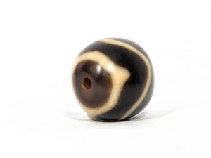 Antique Tibetan Round Dzi Bead featuring Wave & Tiger Tooth Motif (111325)