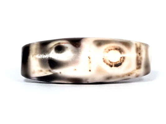 Six eye dzi bead with cream field, brown eye boundaries, and natural agate patterning, 35mm