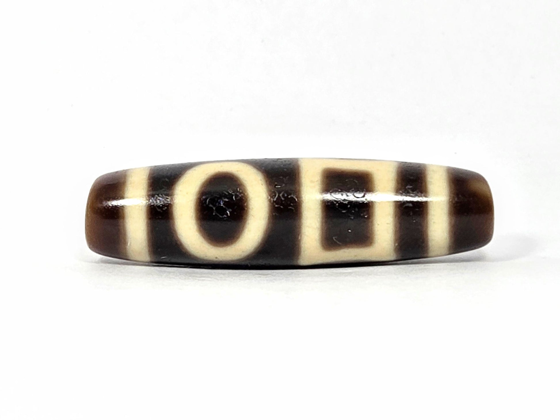 At-090425-DHE antique double heaven earth dzi 40.9x11.1mm very dark brown agate primary face unretouched
