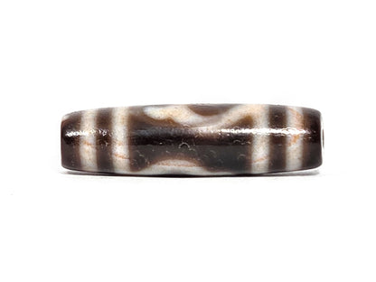 At-080426-GTBS2 antique Green Tara dzi bead 37.8×10.8mm, Face B showing double wave lines on very dark brown ground with stripe borders, unretouched