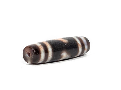 At-080426-GTBS2 antique Green Tara dzi bead 37.8×10.8mm, opposite drill-end angled view showing cream-grey-brown agate end cap and body profile, unretouched