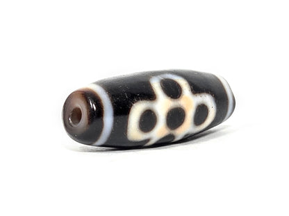 At-062026-5ELT angled view, eye cluster and end cap, warm brown drill