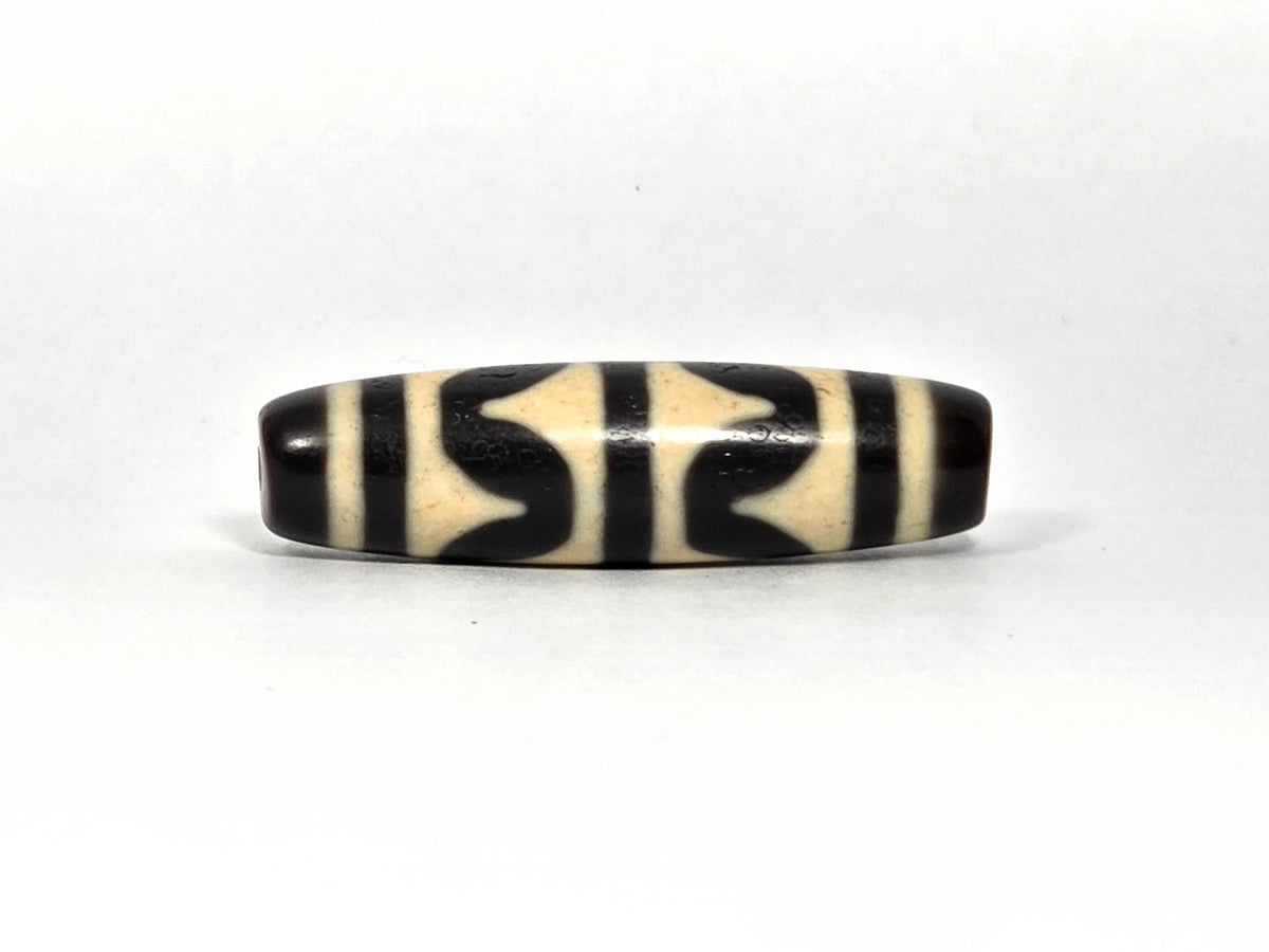 At-090226-DW8 antique double wave dzi cream black agate third rotation narrow profile, unretouched