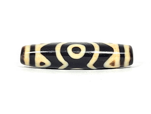 At-061926-3ETT Face B, closed ring eye, double-arc crown, warm cream-beige motif lines, unretouched