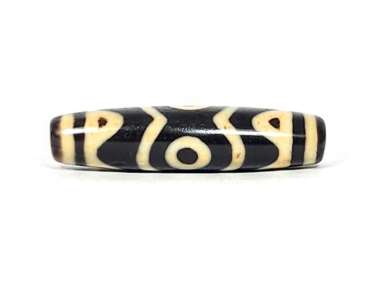 At-061926-3ETT connector face, tiger tooth X-chevron composition, no eye, pitch-black agate, unretouched
