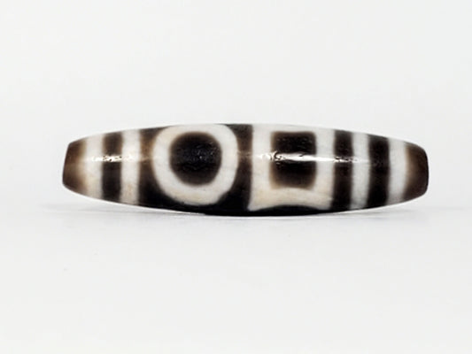 Antique heaven earth gate dzi — Face A, round eye with concentric rings, brown centre spot, warm agate ends, At-0426-DHE