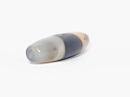 At-061526-1SBow, 3/4 view showing dome tip and drill hole end, cool milky grey-white end cap, unretouched