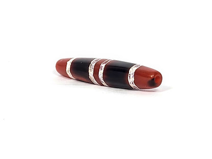 At-122324-3TS antique 3-stripe carnelian dzi, reverse face, partially worn stripe, natural banding, unretouched