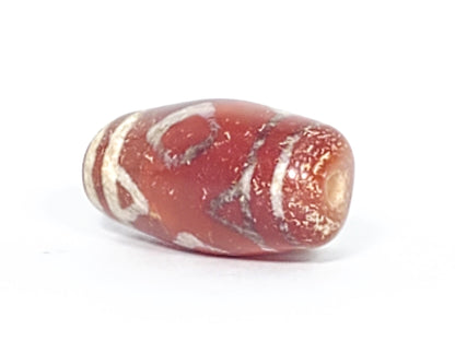 At-053126-3DETT antique carnelian dzi, left end cap drill hole, cream-white mineral band, terracotta body, unretouched