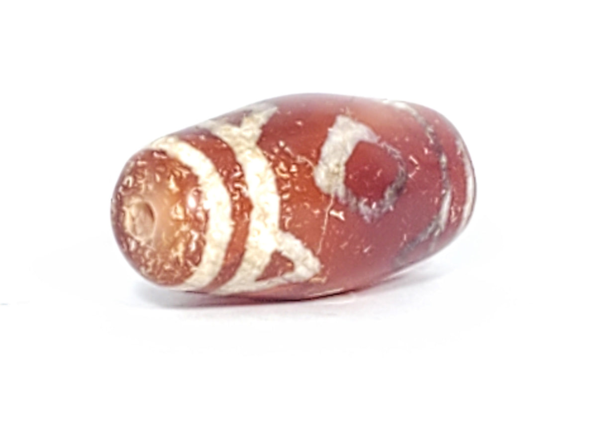 At-053126-3DETT antique carnelian dzi, right end cap drill hole, orange-red end cap, mineral collar, unretouched