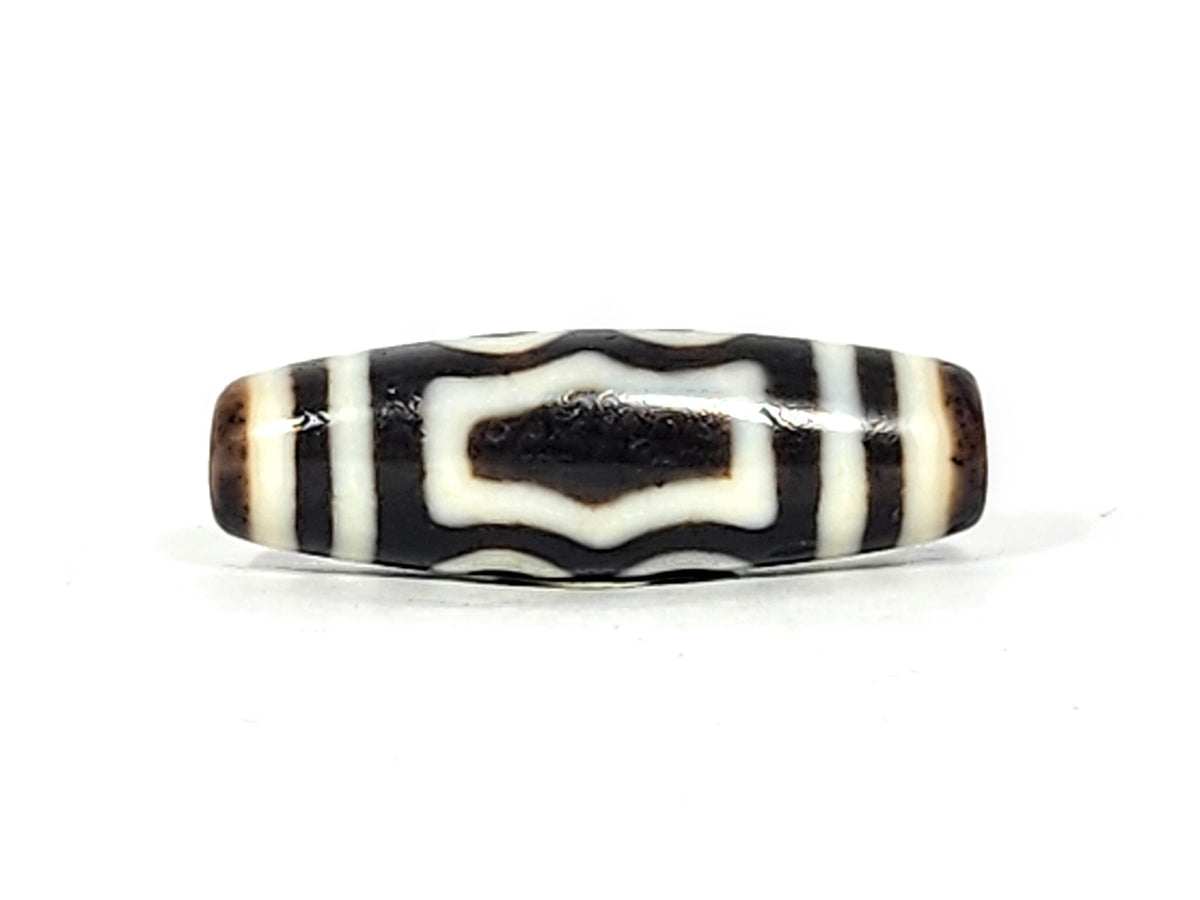 At-061926-4EEG earth gate face close view, warm dark brown inner void, high-gloss surface, unretouched
