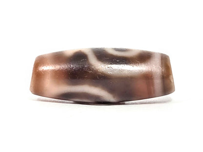 At-061826-2ETV top face, faceted hexagonal profile visible, warm reddish-brown translucent chalcedony ground, unretouched