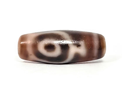 At-061826-2ETV Face B, closed oval eye ring on warm chocolate-brown chalcedony, soft-edged cream motif lines, unretouched