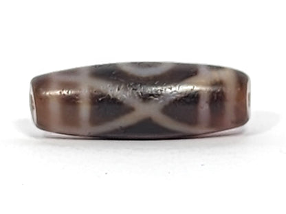 Antique two-eye dzi bead brown agate white X motif bloodspots aged patina visible drill holes collectible Tibetan
