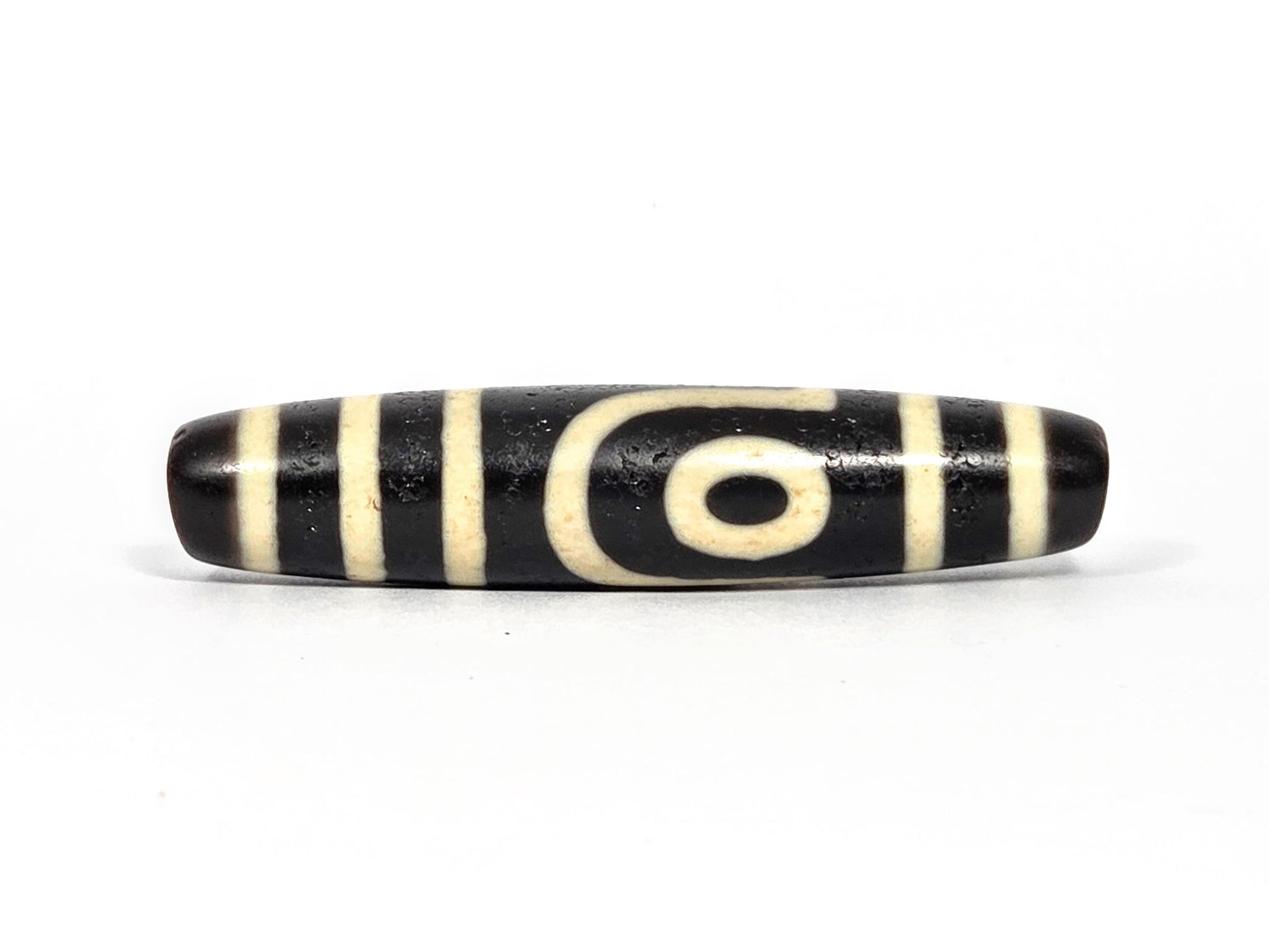 At-080226-2E5 antique two eye dzi 56.0×12.2mm pitch-black agate face A concentric eye stripe separators unretouched