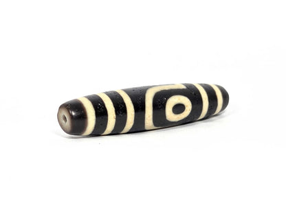At-080226-2E5 antique two eye dzi drill end B warm dark brown agate-internal colour eye wrap unretouched