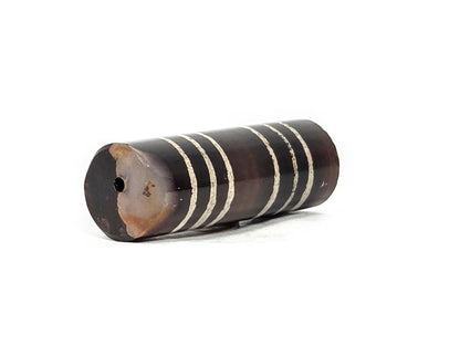 Ac-062226-6Str, intact end showing centred drill hole, deep warm dark brown, six-stripe agate dzi, unretouched