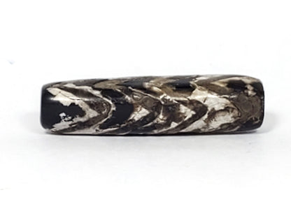 Ancient Tibetan Four-Row Tiger Tooth Dzi bead, 32.7mm — deep black agate with four rows of bold cream chevron pattern under heavy calcification — 800–1,000 years old — Anc-0426-4TT