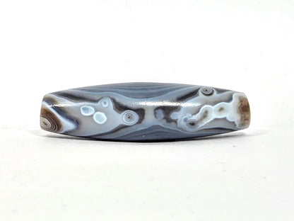 Antique Dzi Bead featuring Naturally Formed One Eye Motif (010126)