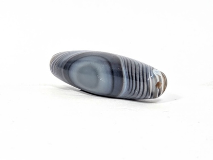 Antique Dzi Bead featuring Naturally Formed One Eye Motif (010126)